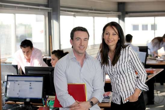 Business partners in a busy office